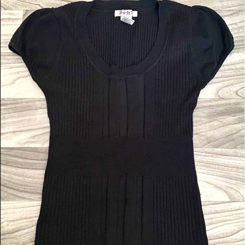 Females Shirt. Very Fitted. Made In China.